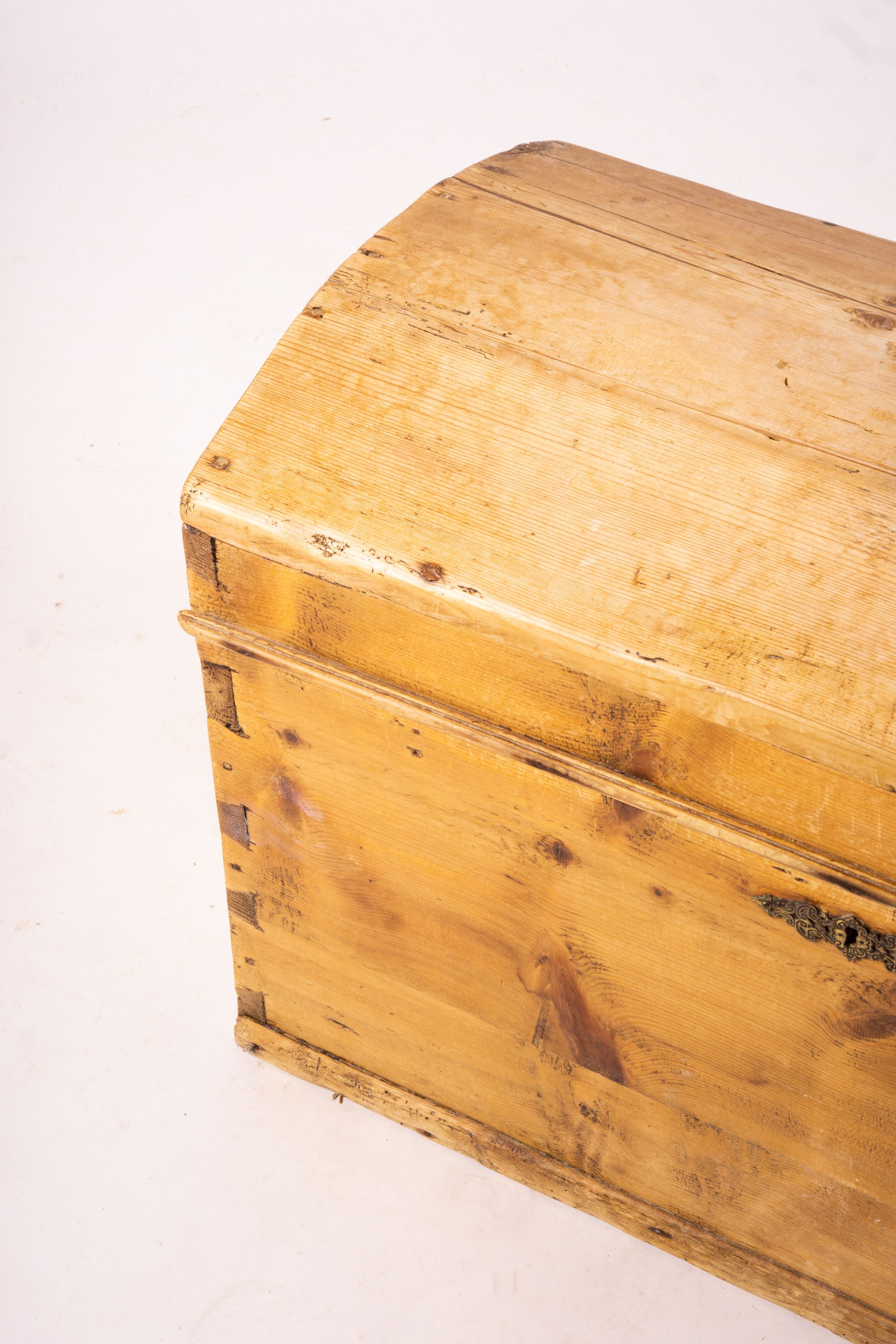 A small 19th century Continental pine domed top trunk, length 74cm, width 40cm, height 46cm